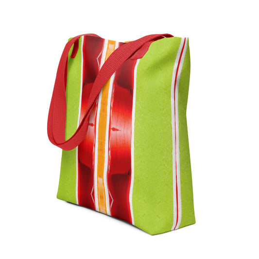 Bright green red and orange tote bag with red handle, side view